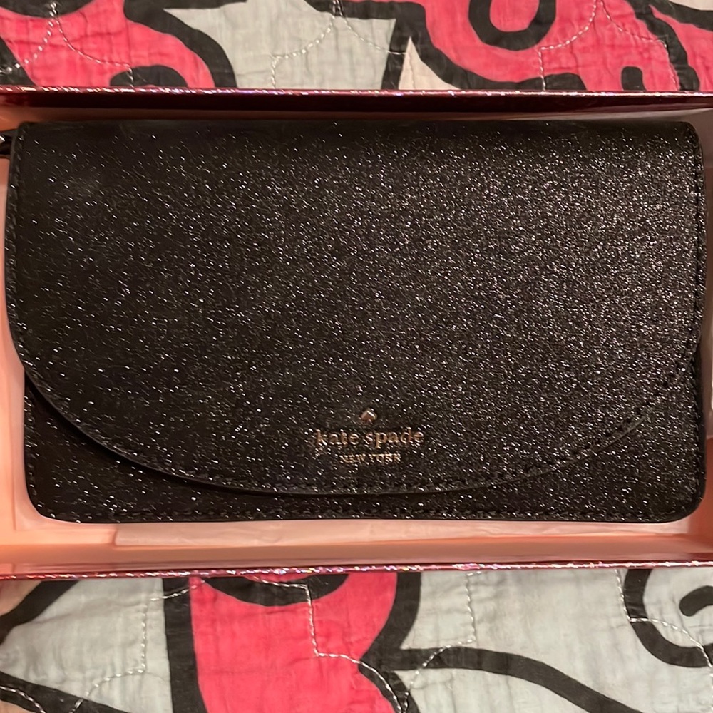 EUC joeley wristlet in black glitter Kate spade